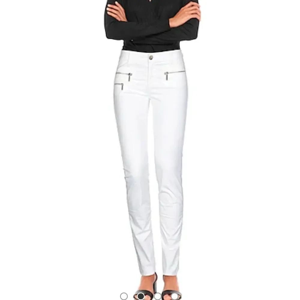 Benetton white distressed jeans with three zippers in front and slit  ankle XS